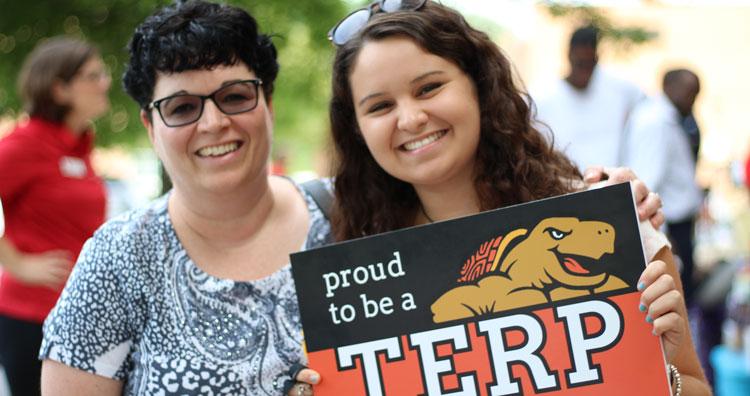 Mother and daughter with proud to be a terp sign
